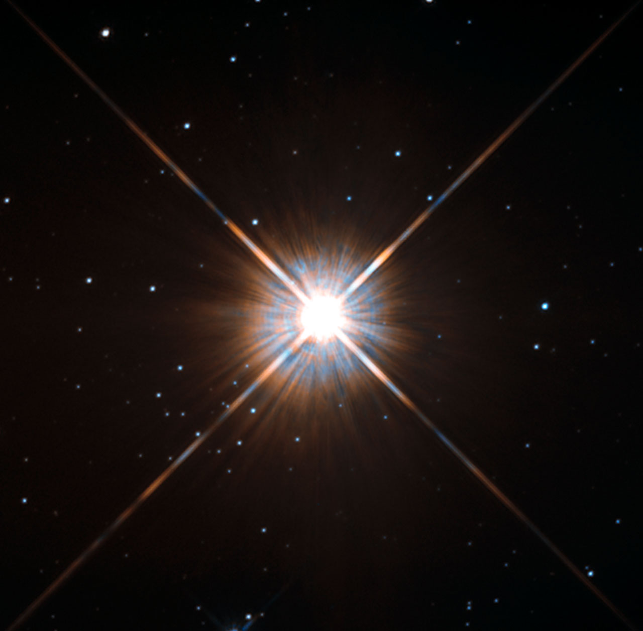 Hubble image of Proxima Centauri, a bright point with diffraction spikes