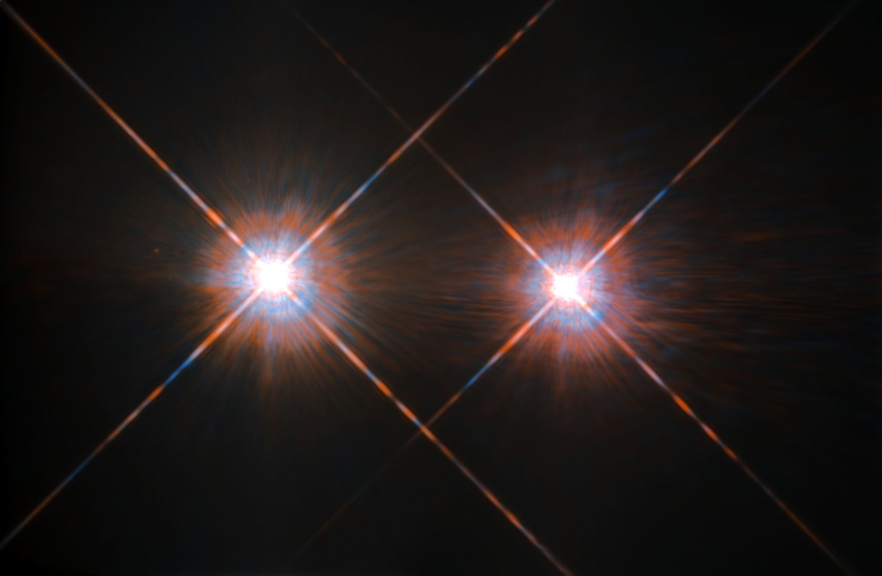 Hubble image: two bright stars, Alpha Centauri A on the left and B on the right